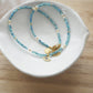 Dainty Blue Beaded Choker Necklace with Evil Eye Pendant